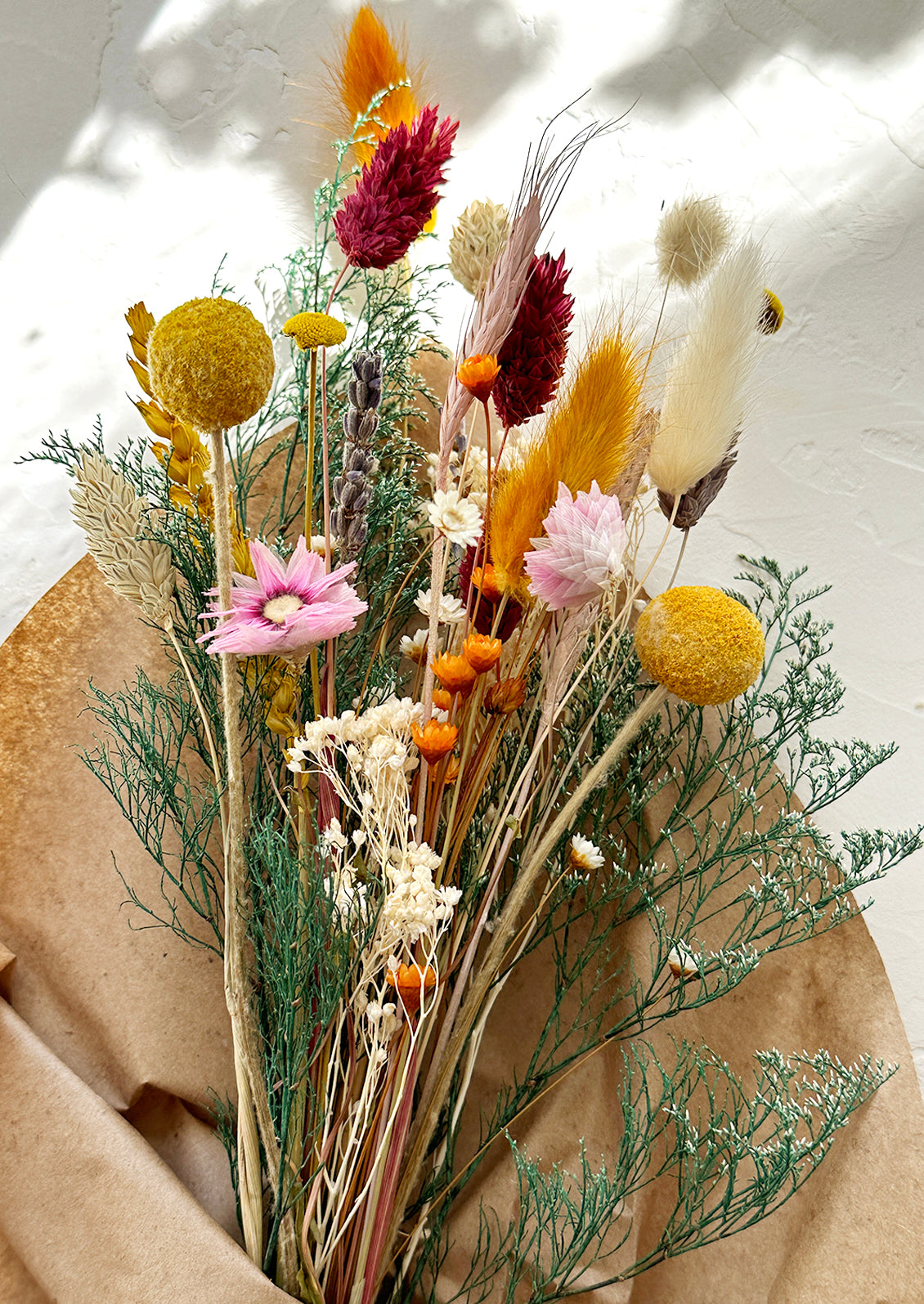 A multicolor bouquet of dried flowers.