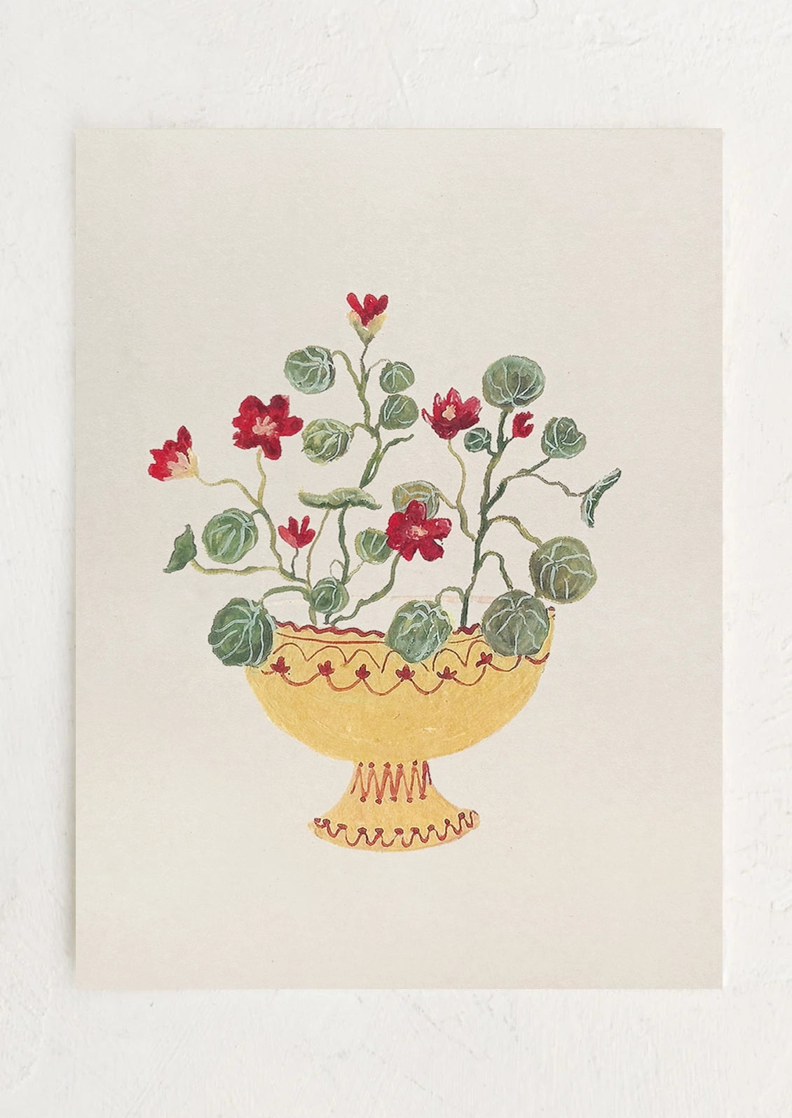 An art print of a painting of crimson nasturtiums in a yellow compote bowl.