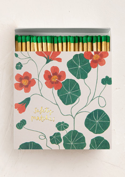 Matches with floral design and 'Safety Matches' text on a white background