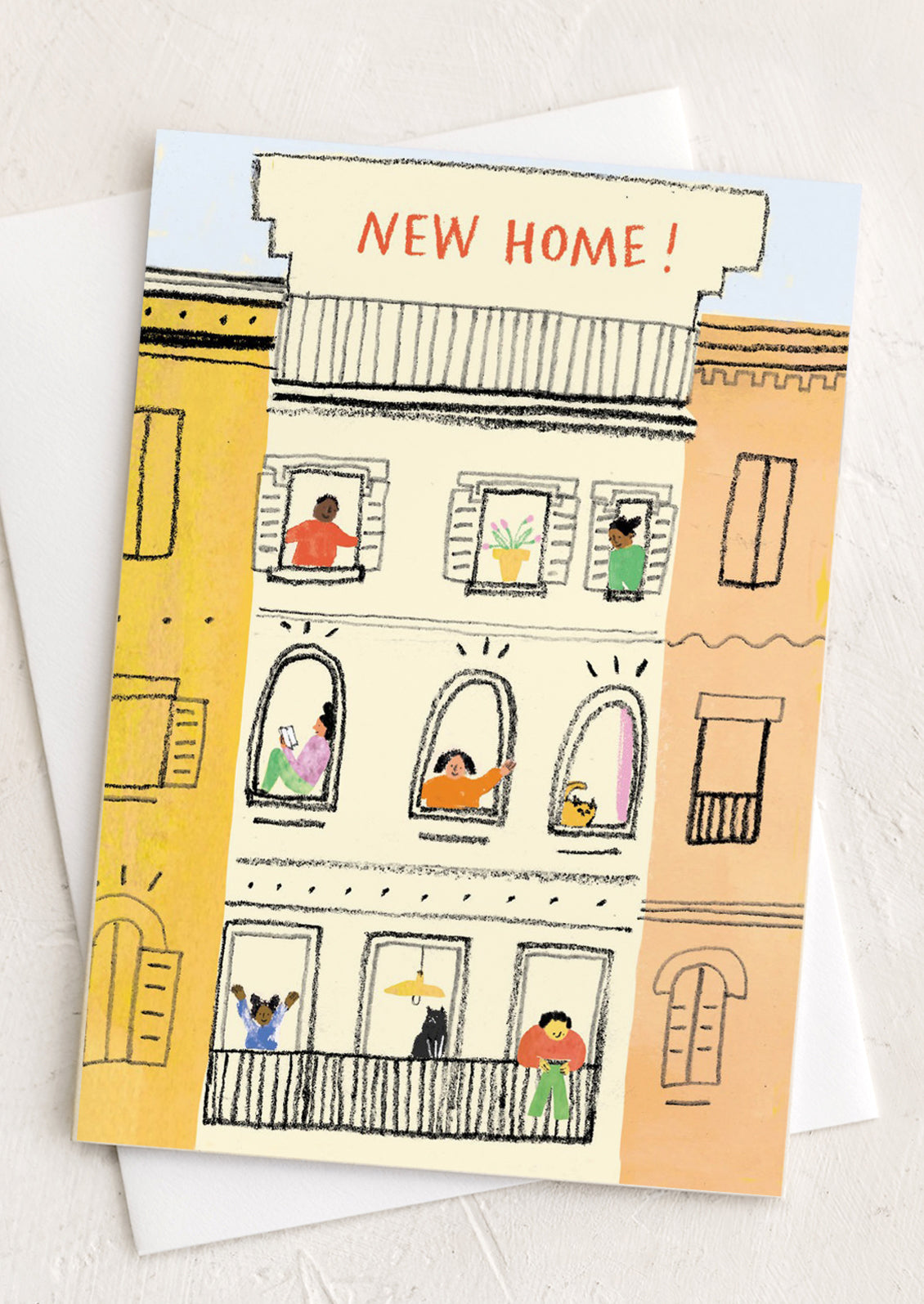 An illustrated greeting card reading "New Home!".