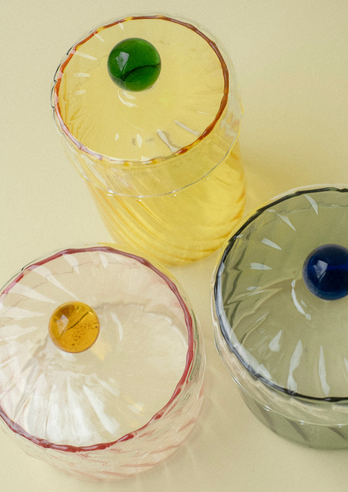 Swirl glass colorful jars in assorted colors.