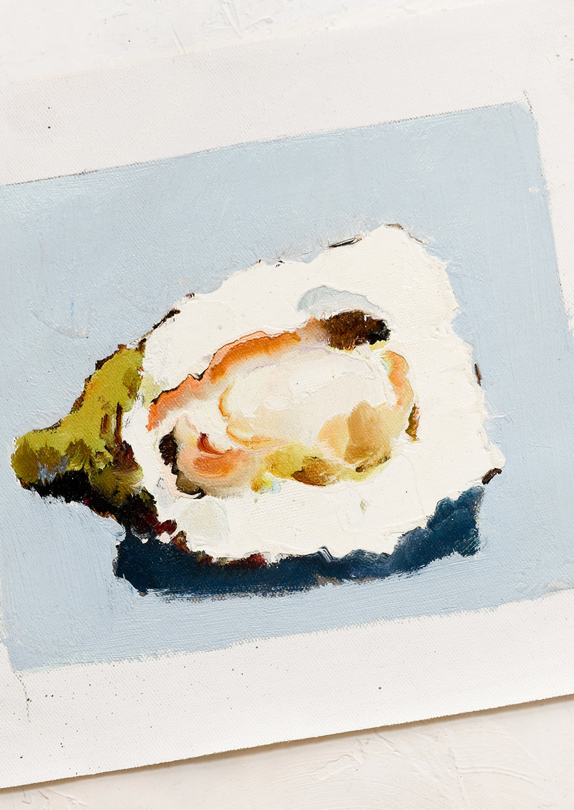 An oil painting on unstretched canvas of still life oyster on blue background.