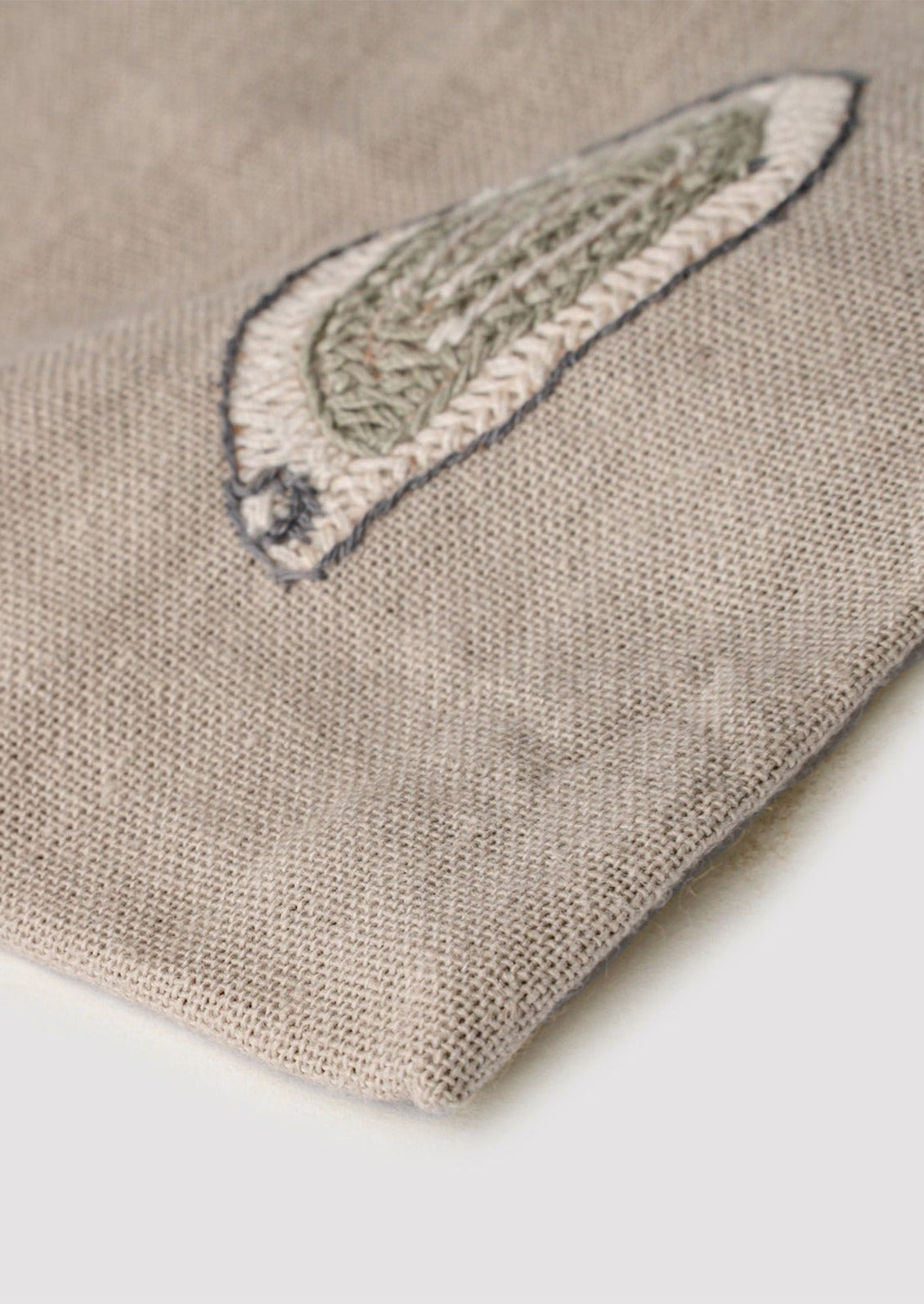 Oyster embroidery detail.