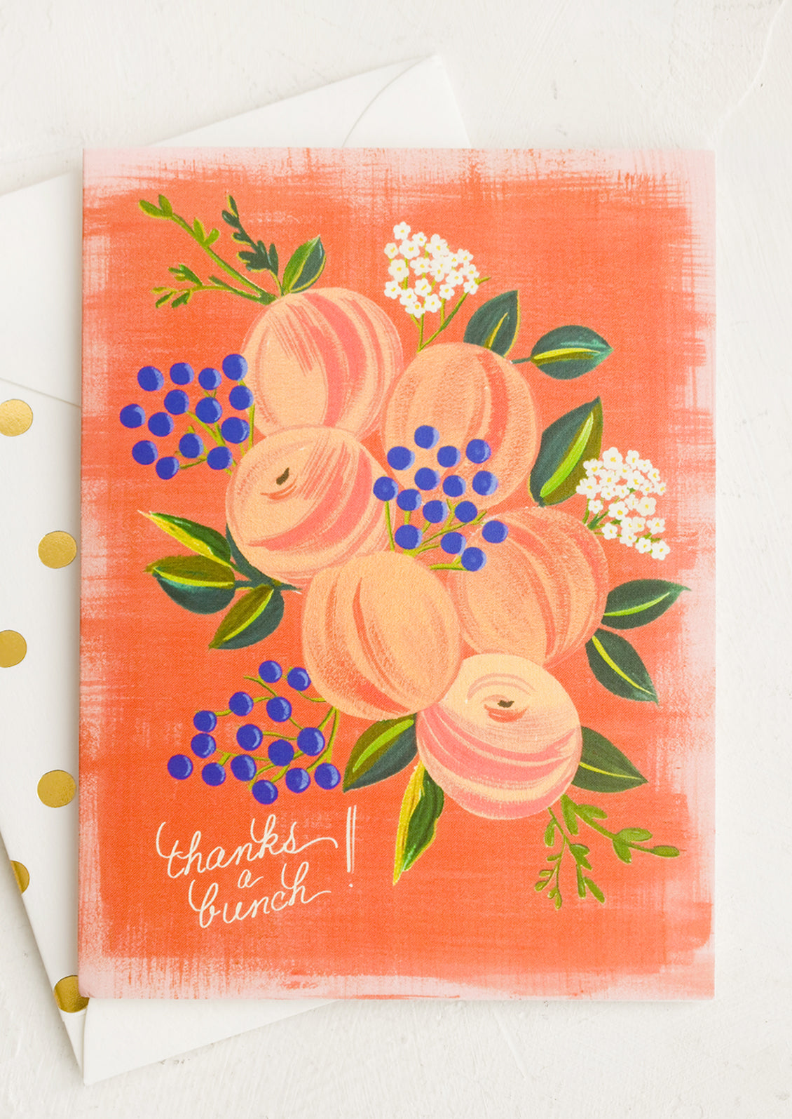 A peach print thank you card.