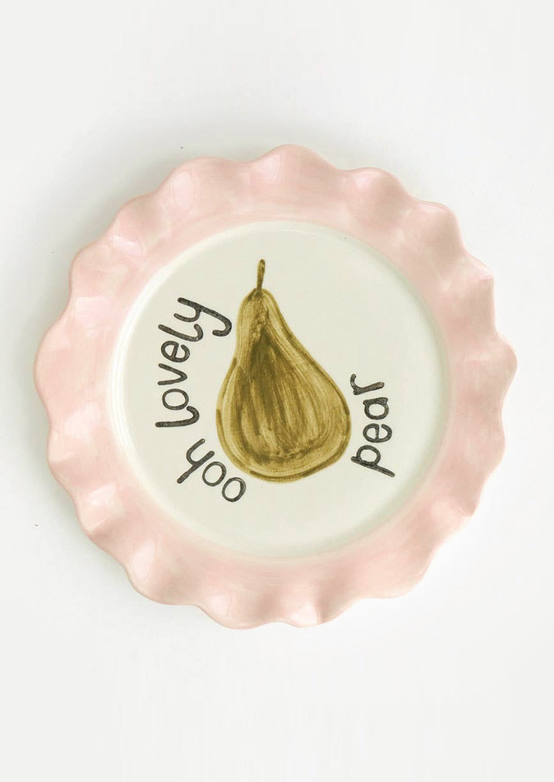 A printed ceramic plate with pink colored rim and pear graphic, text reads "Ooh lovely pear".