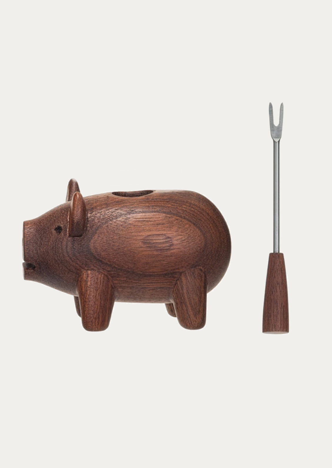 Wooden pig-shaped holder with a coordinating appetizer fork.