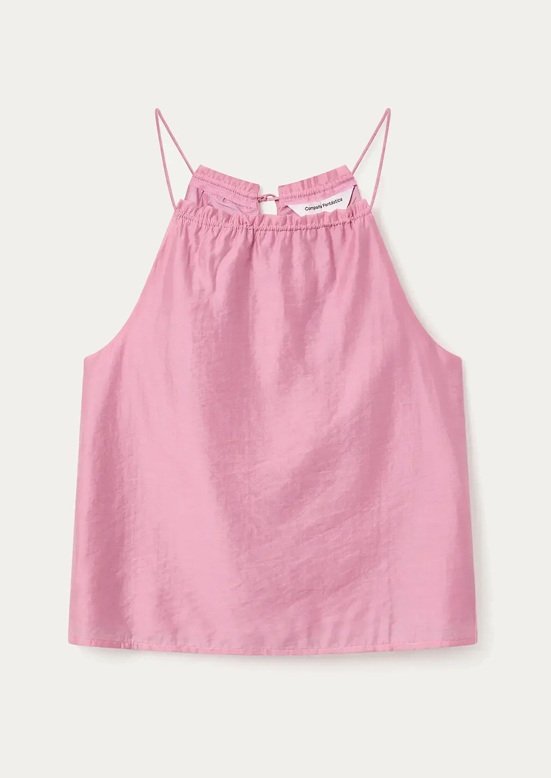 Pink camisole top with thin straps on a white background
