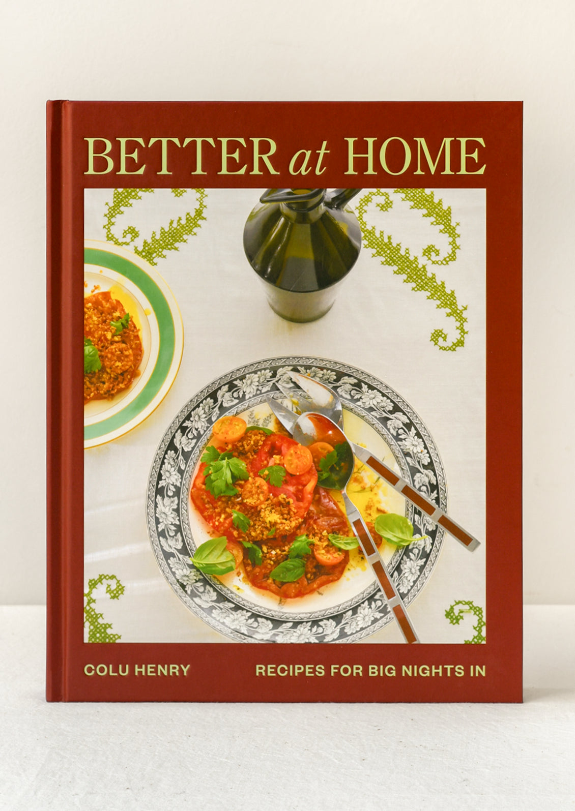 A book titled "Better at Home" by Colu Henry.