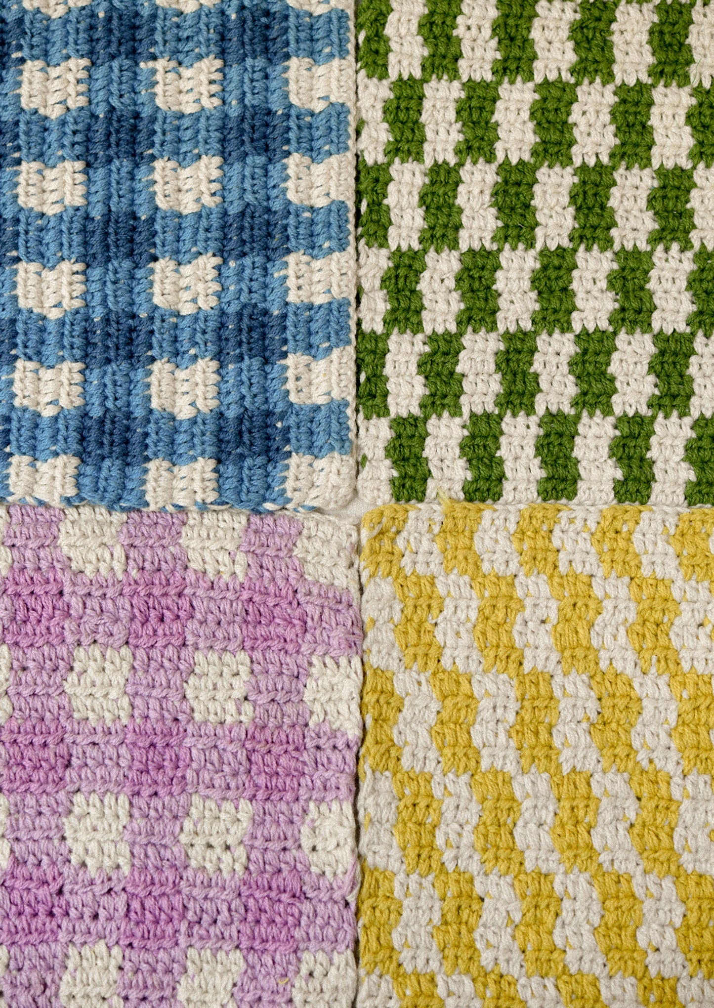 Colorful plaid crocheted potholders.