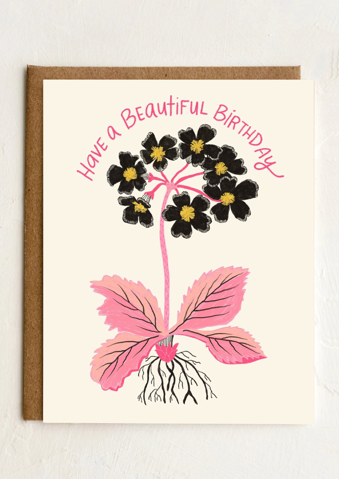 A primrose illustrated birthday card that reads "Have a beautiful birthday".