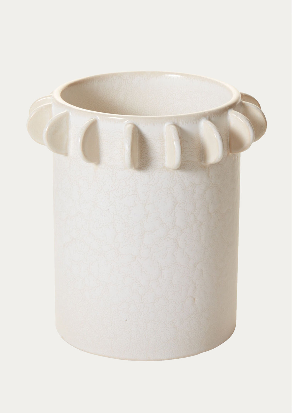 A white ceramic cylindrical crock with decorative tab detail around top rim.