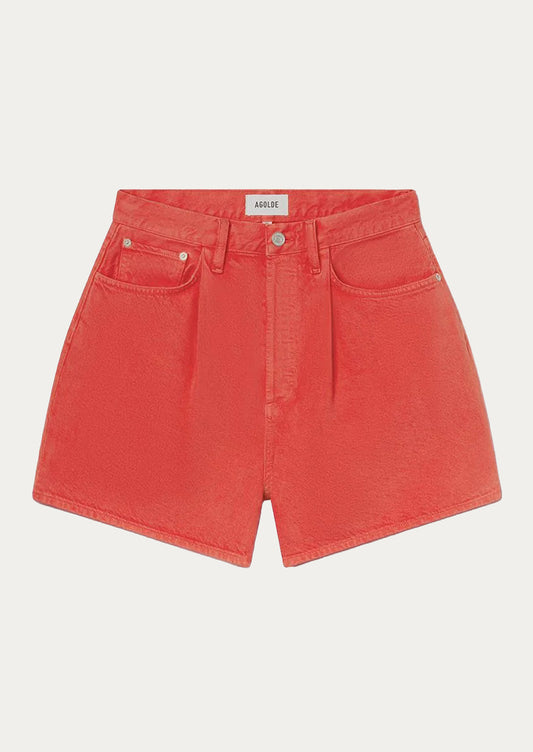 A pair of pleated a-line shorts in red.