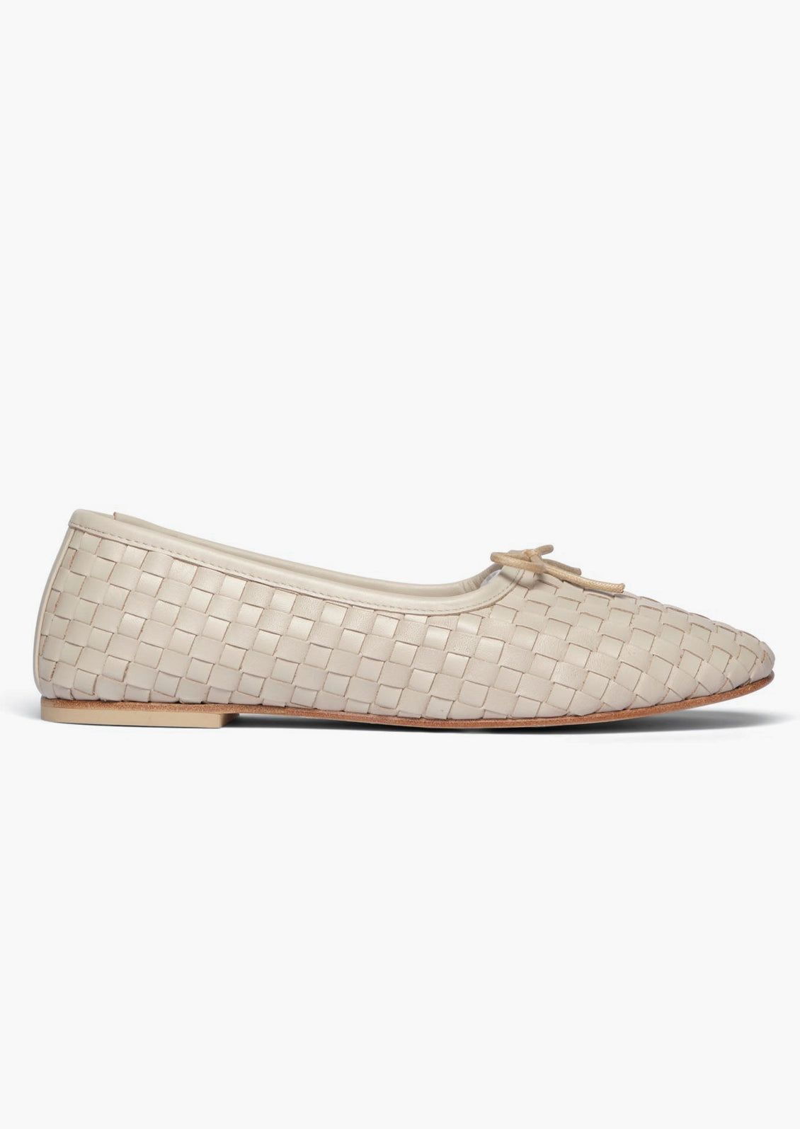 Cream woven leather ballet flats with bow detail on vamp.