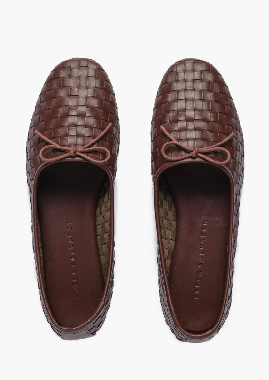 Dark brown woven leather ballet flats with bow detail.