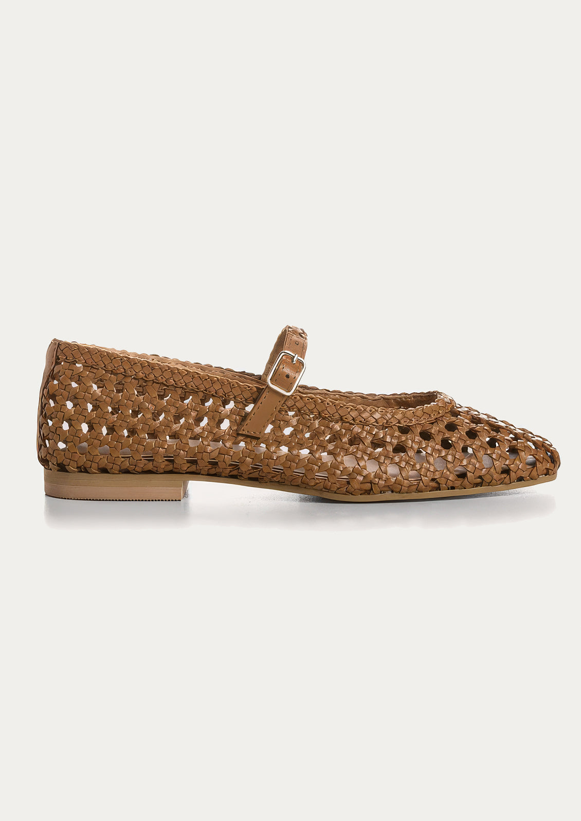 A pair of brown open weave ballet flats.