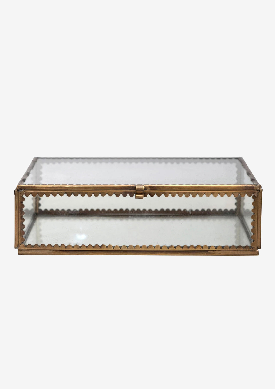 Clear glass boxes with scalloped brass decorative trim.
