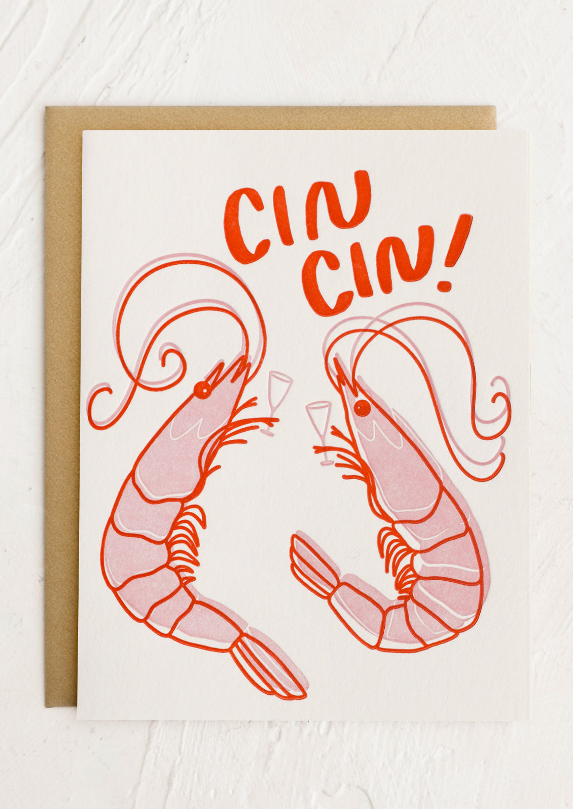 A card with illustration of two shrimp holding wine glasses, text reads "Cin cin!".