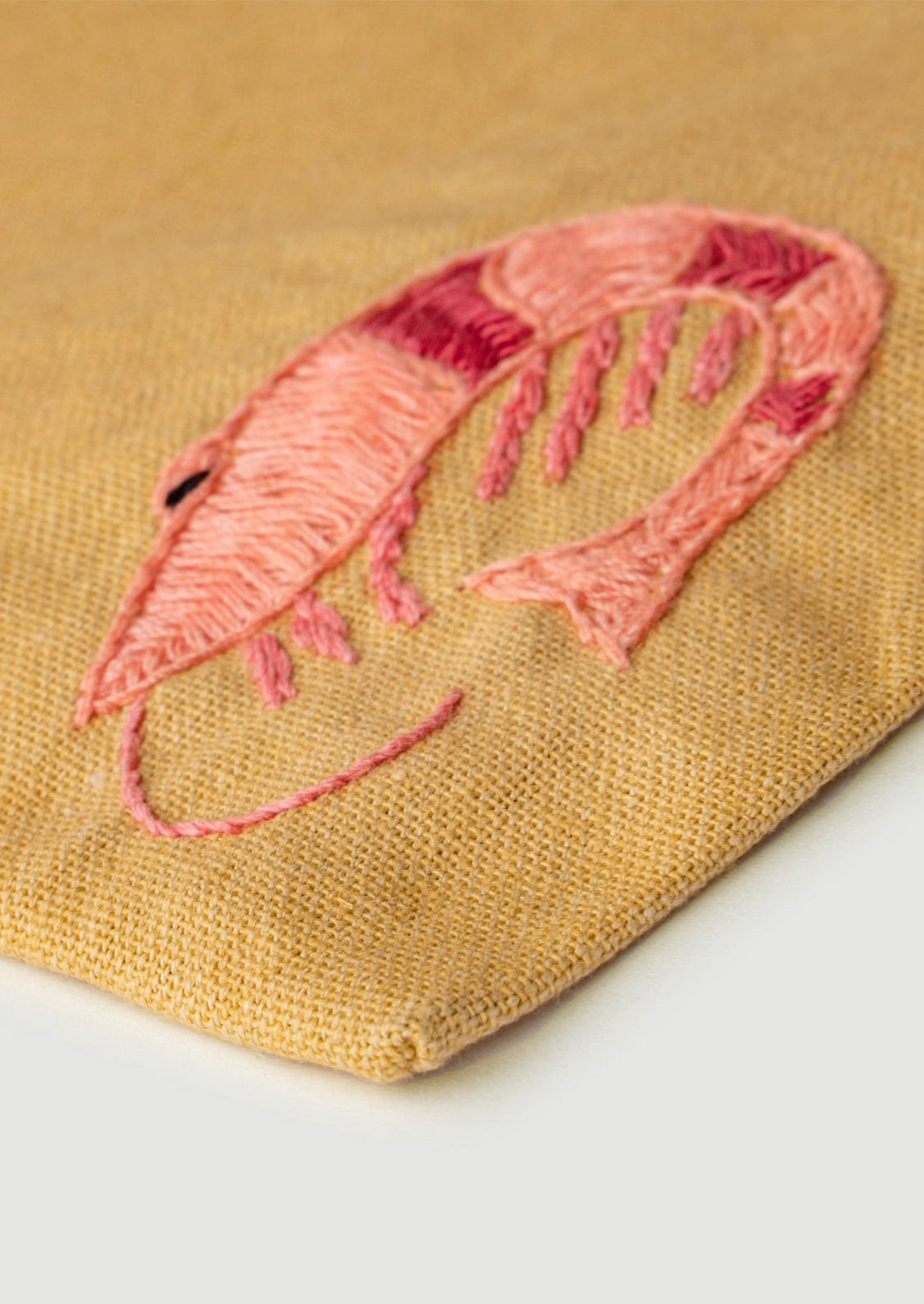 Shrimp embroidery detail.