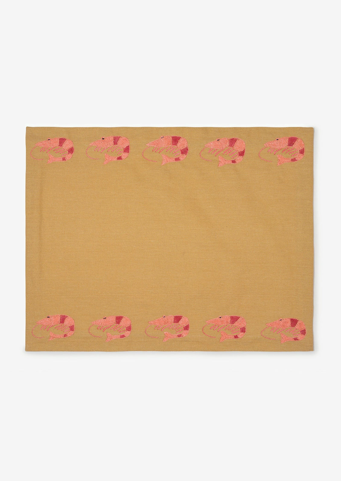 A tan cotton placemat with embroidered shrimps on top and bottom.