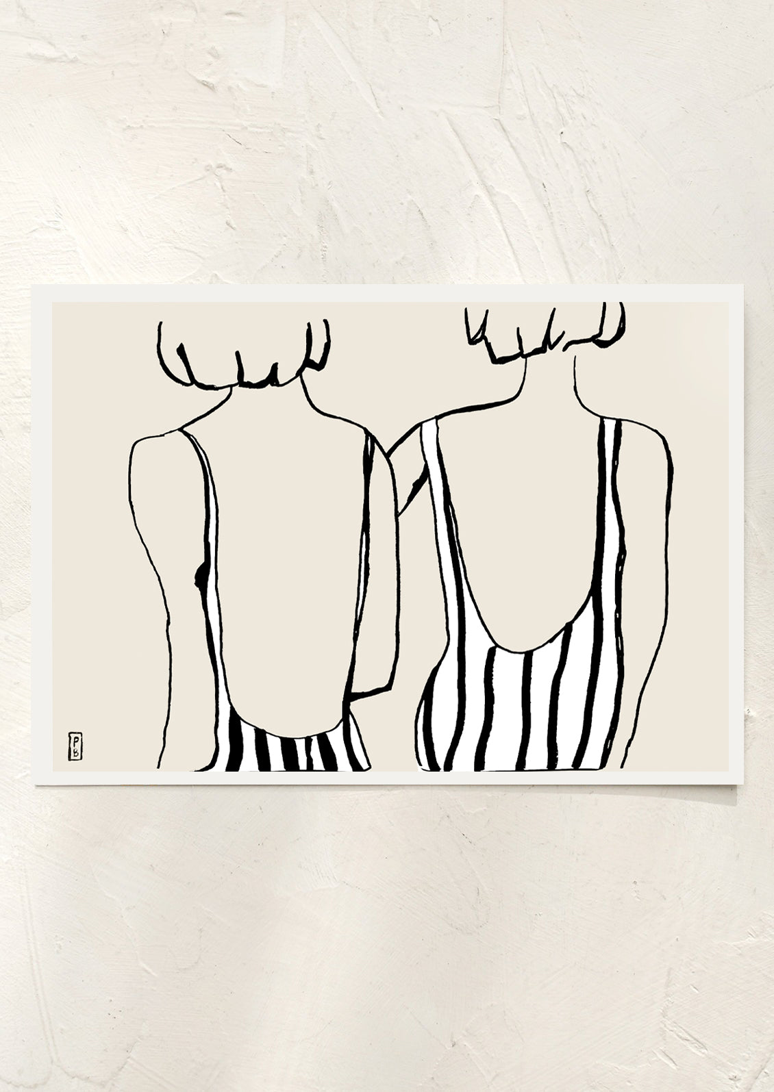 An art print in beige, black and white of an illustration of two seated girls in swimsuits, viewed from behind.