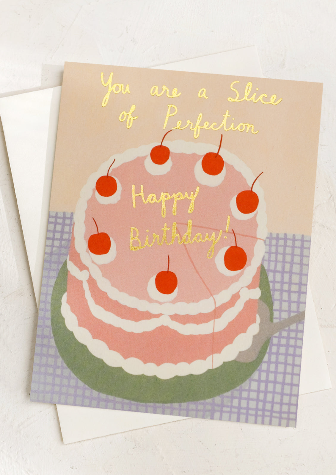 A card with illustration of layer cake, text reads "You are a slice of perfection - happy birthday".