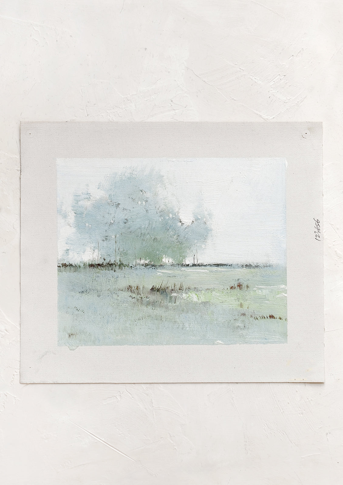 An original oil painting on unstretched canvas of a landscape.
