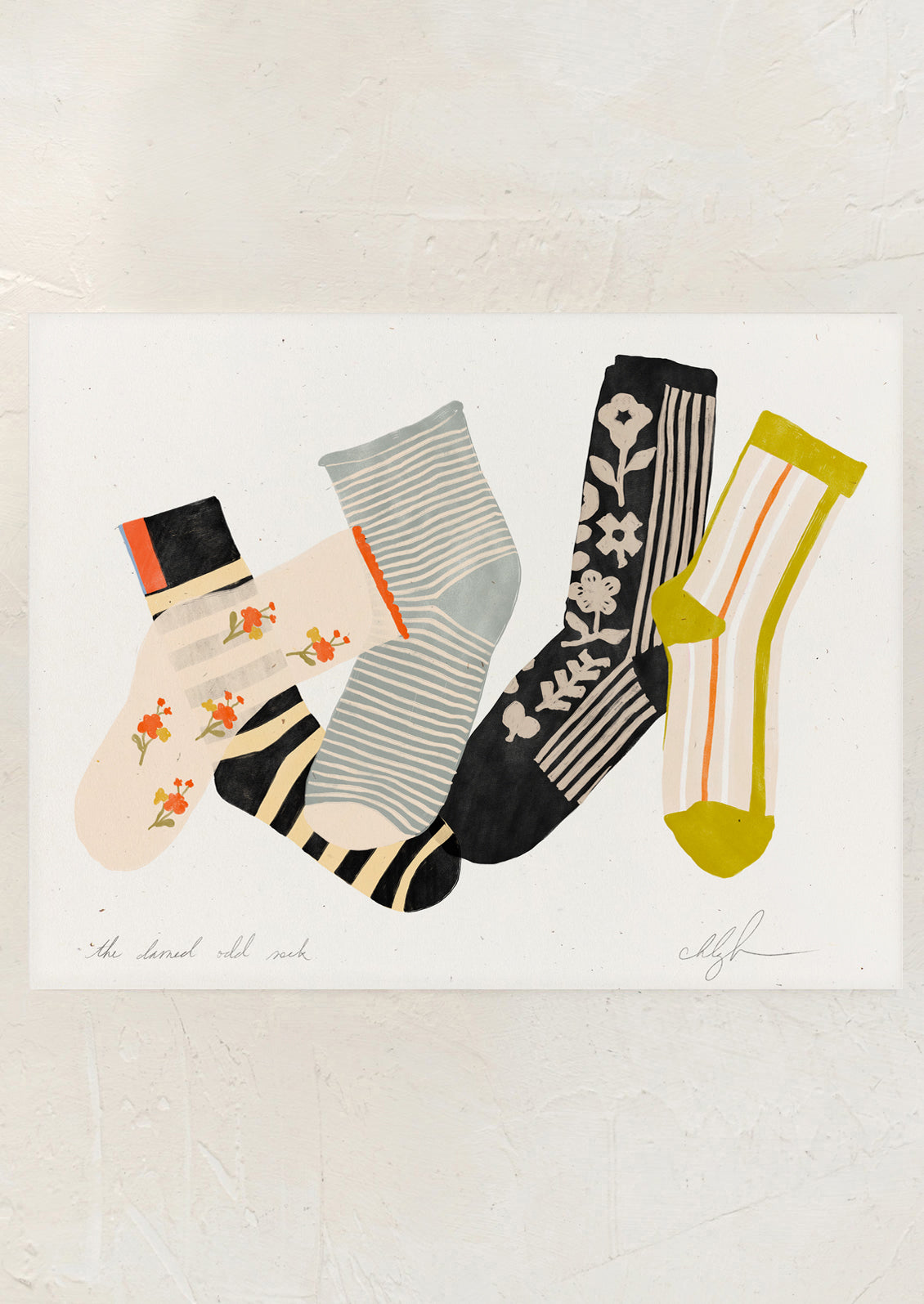 An art print of five pairs of socks with different designs on a light background