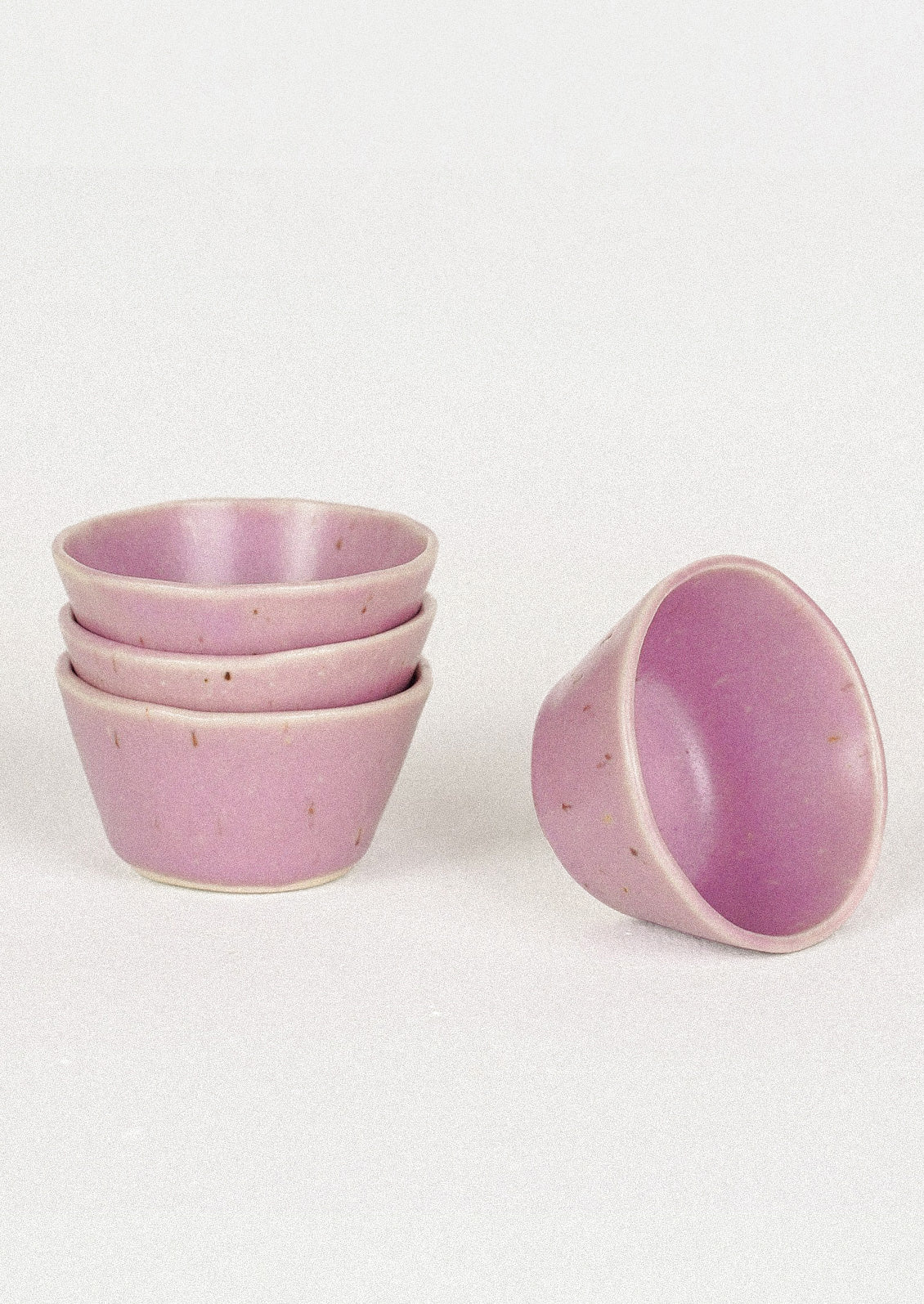 Small ceramic bowls in lilac.