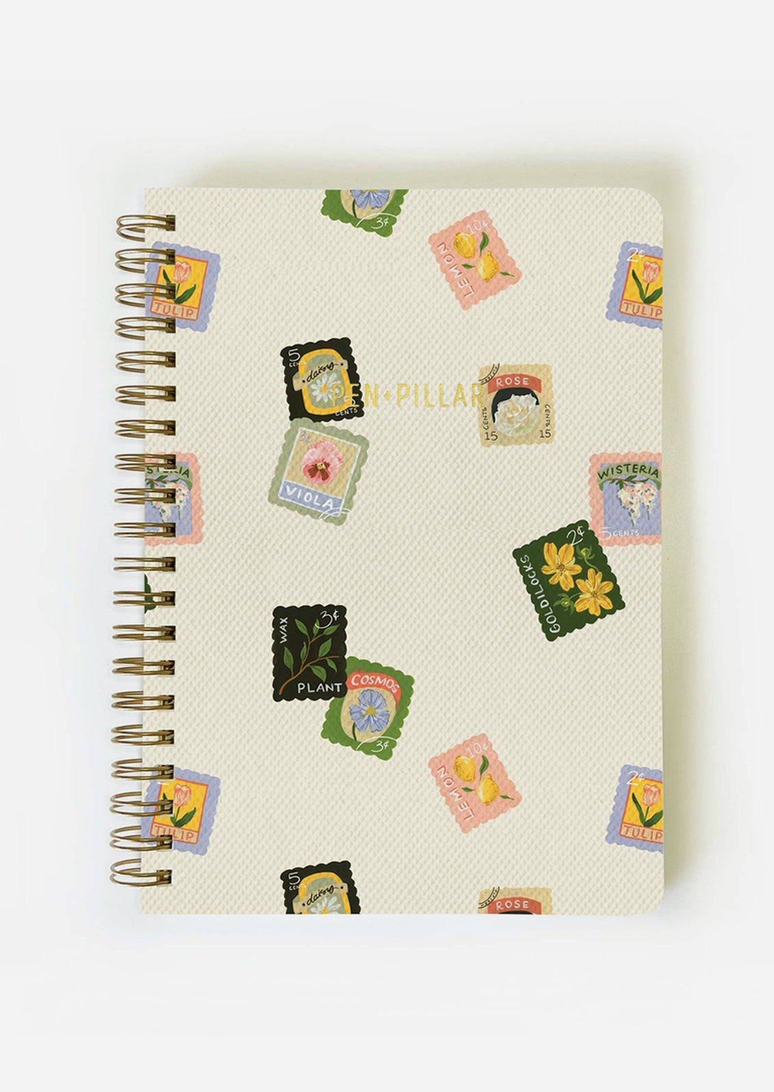 A spiral bound notebook with floral stamp illustrated cover.