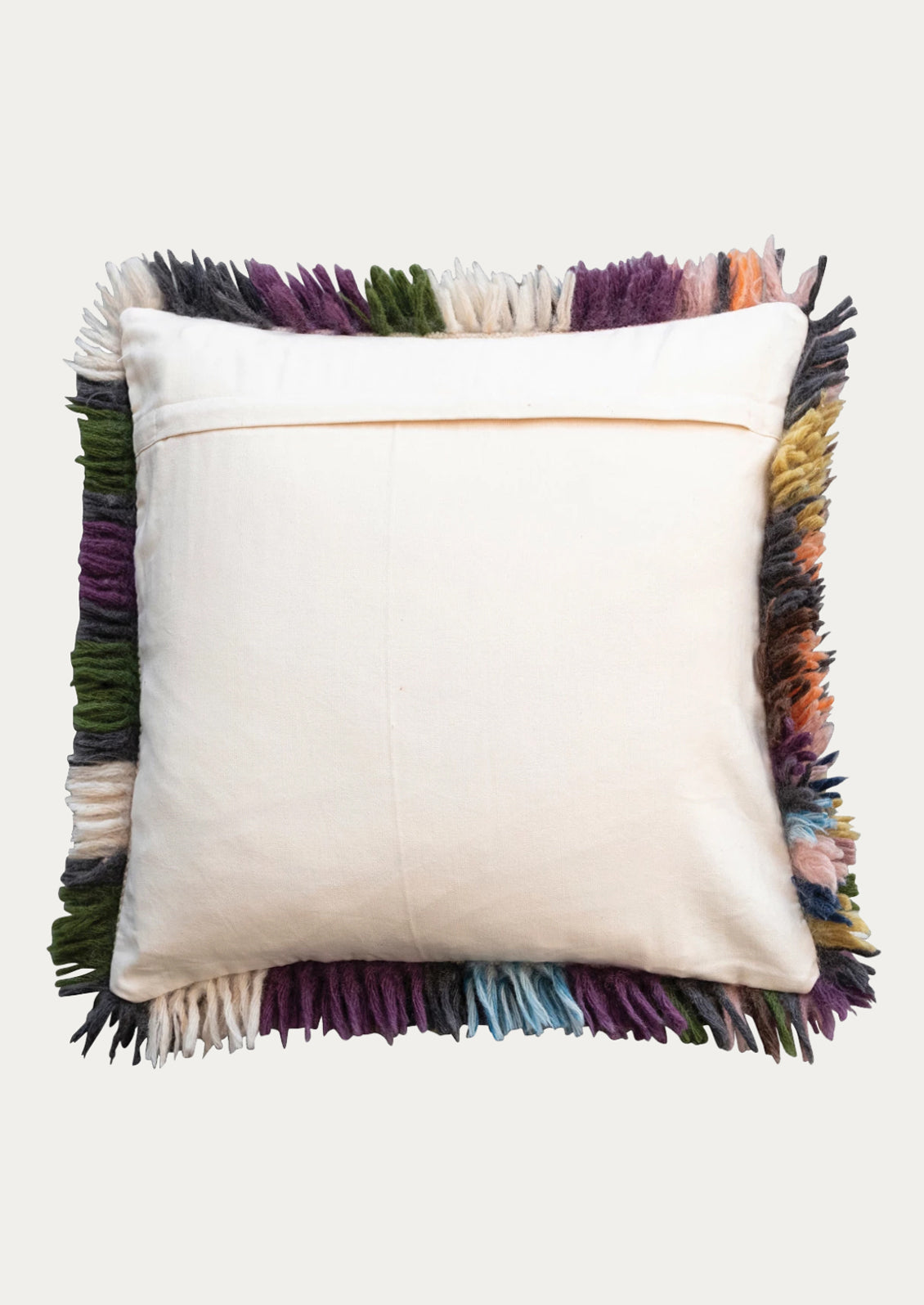A throw pillow with natural cotton back with zip closure.