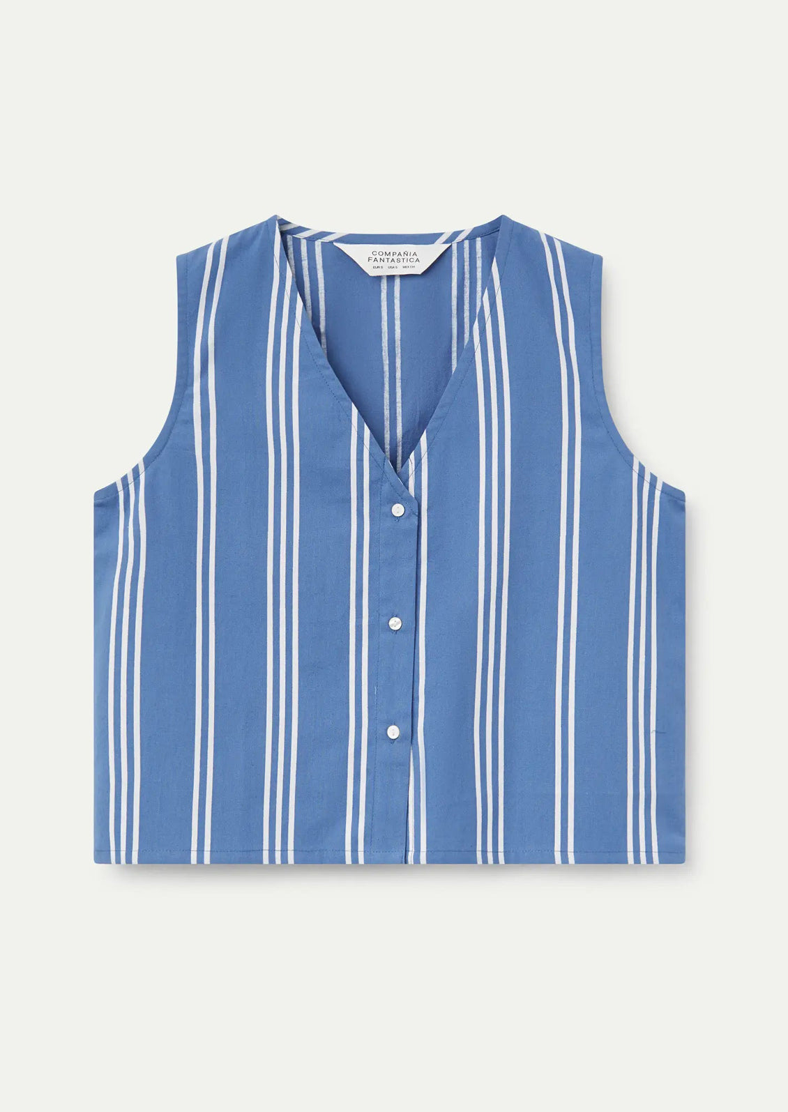 A v-neck button front top in blue with white vertical stripes.