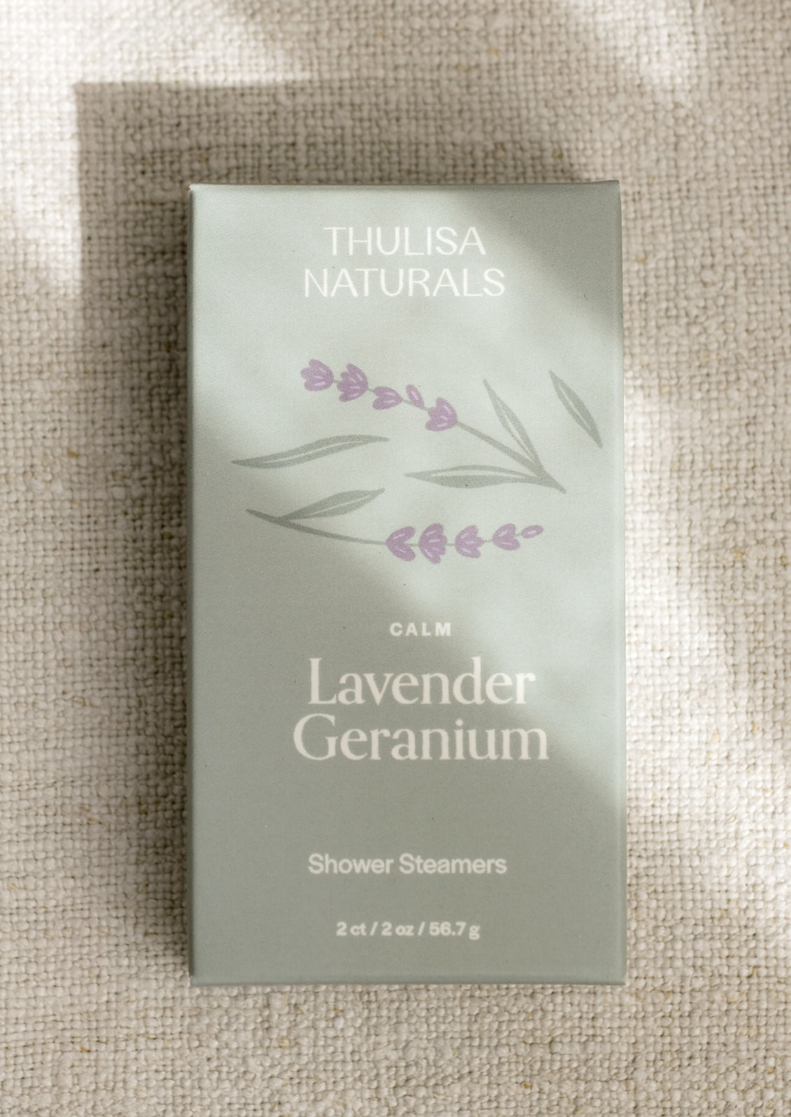 A 2 pack of shower steamers in lavender geranium "calm" scent.