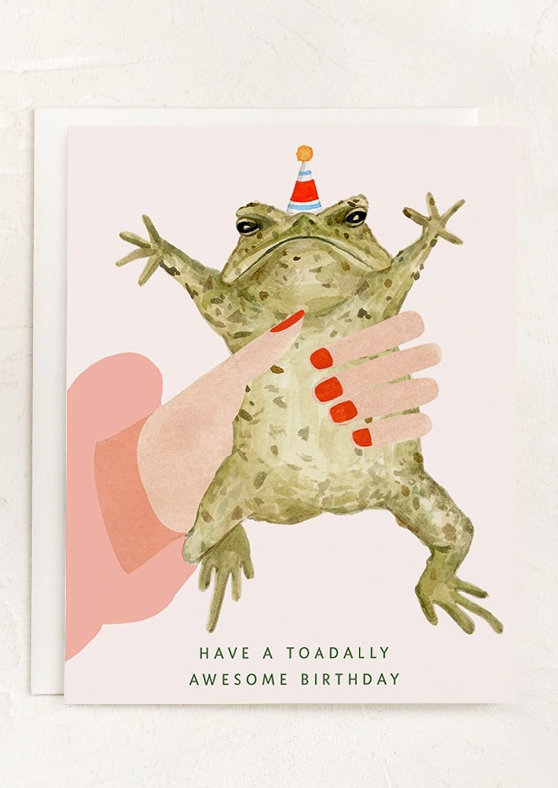 A greeting card with illustration of a toad wearing a party hat, text reads "Have a toadally Awesome Birthday".