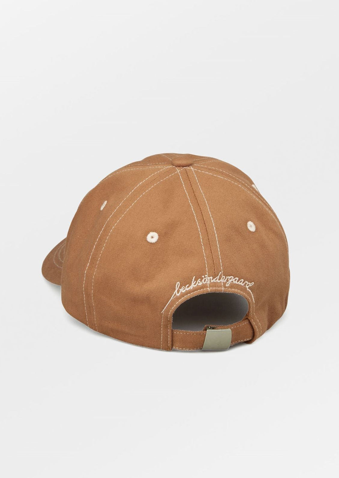 A brown color baseball cap with contrast white stitching.