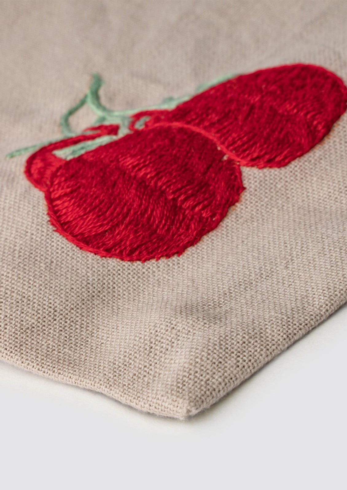 Tomato embroidery detailing.