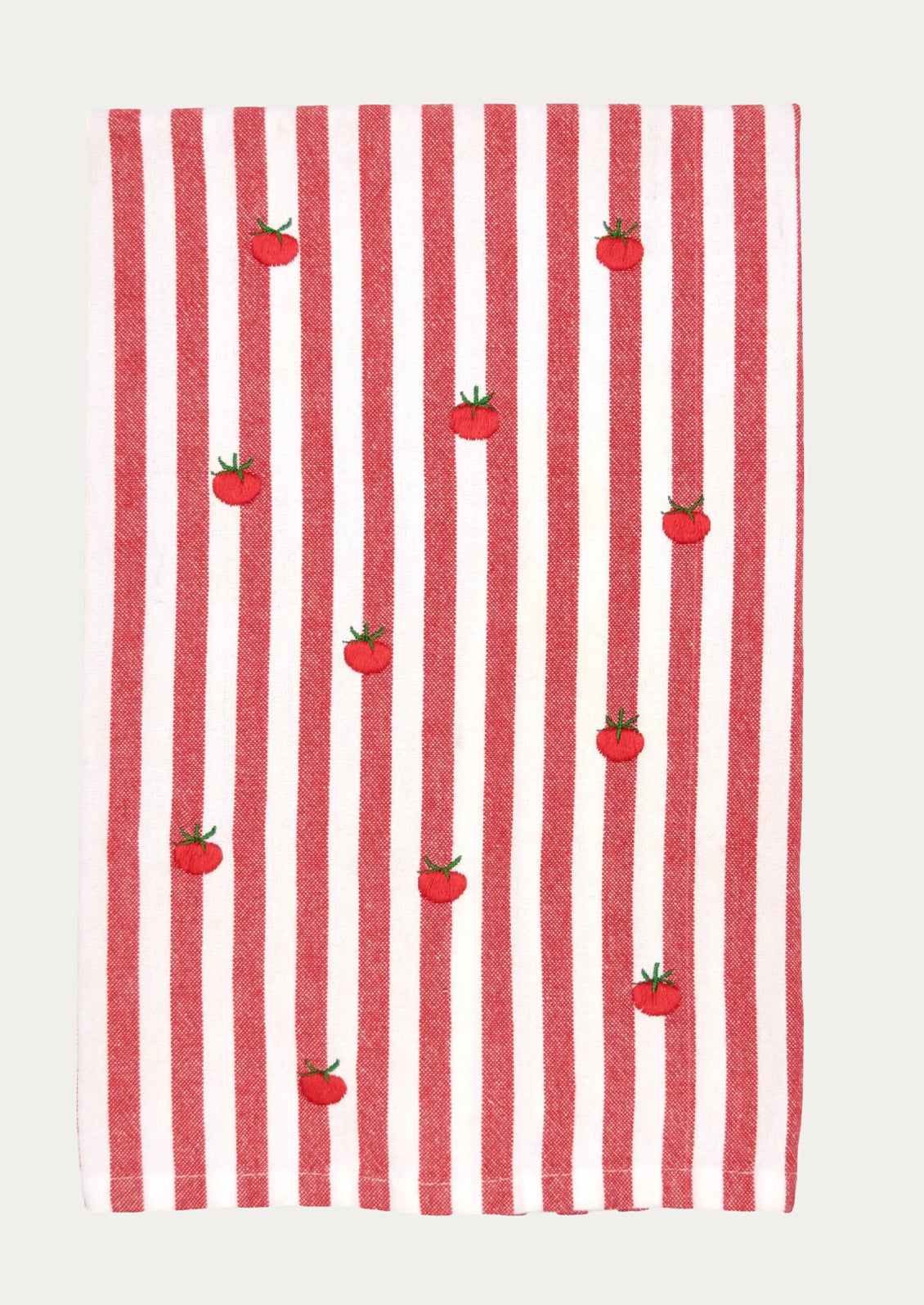 Red and white striped towel with small red tomato patterns on a white background