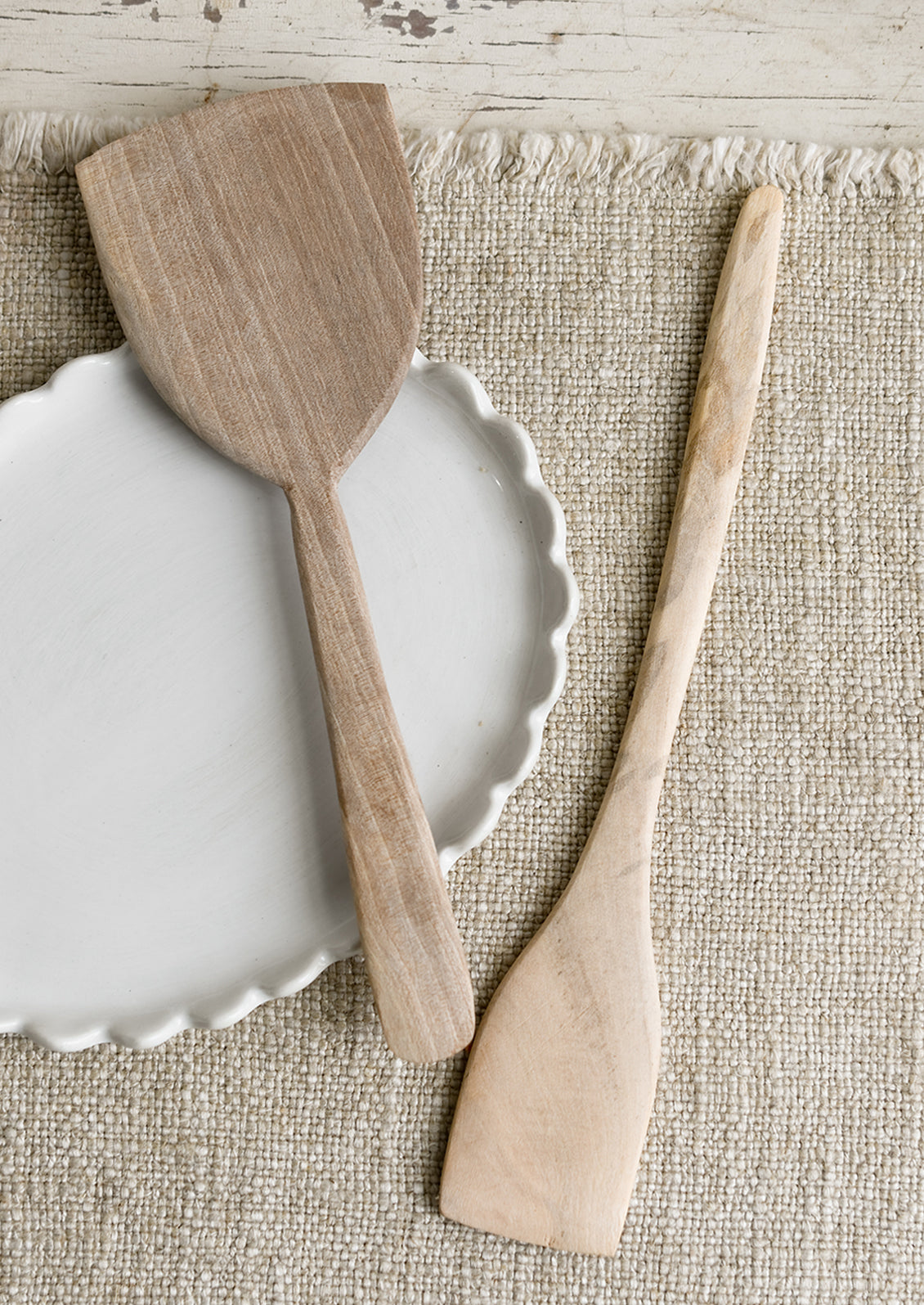 Walnut wooden spatulas in small and large sizes.