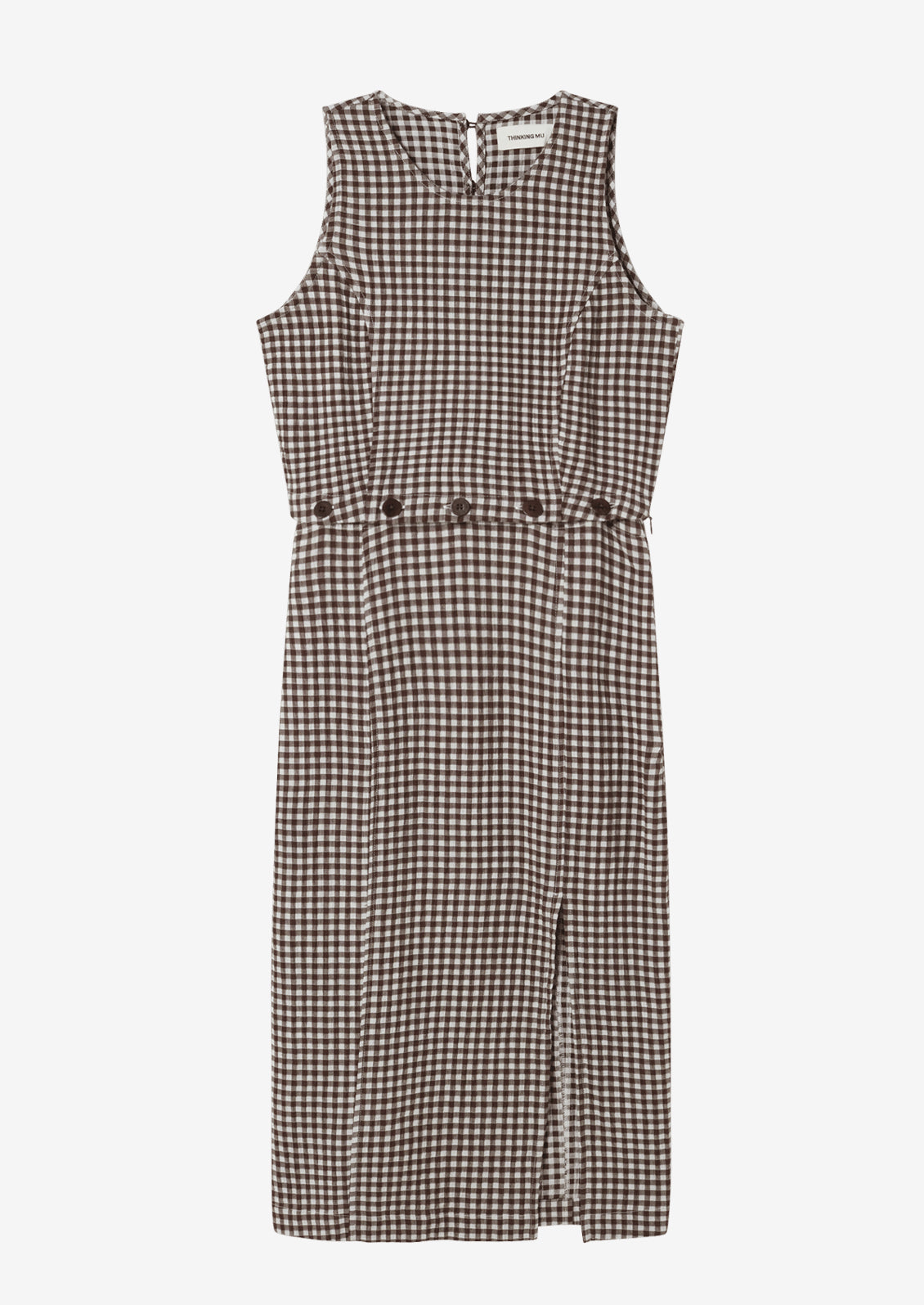 A sleeveless shift dress with button waist detail.