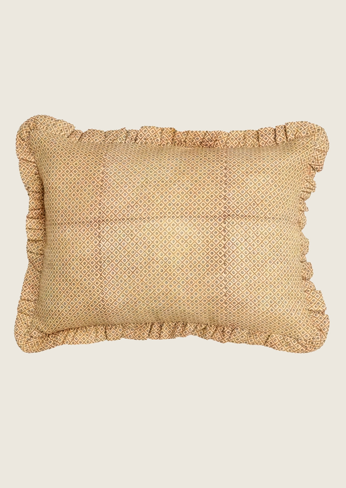 Yellow geometric patterned linen pillow with ruffled edges.