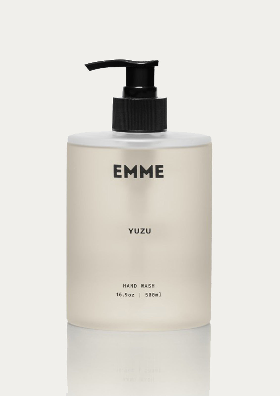 Hand wash bottle labeled 'EMME YUZU' on a light background