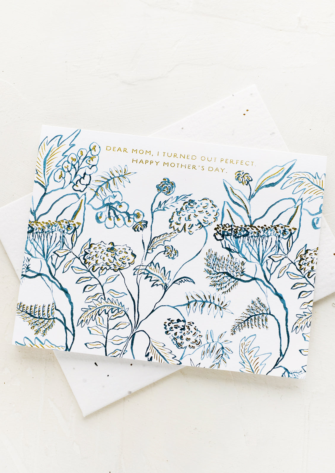 A floral print card reading "Dear mom, I turned out perfect. Happy Mother's Day".