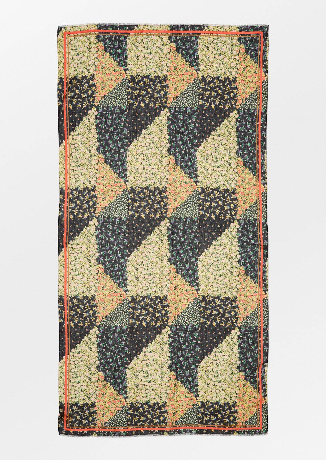 A scarf with patchwork floral design in black multicolor.