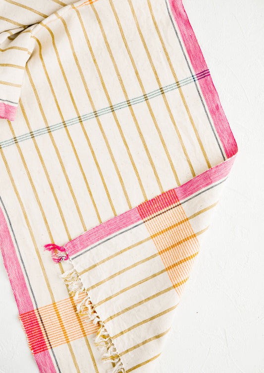 Cotton table runner in plaid/stripe print in a mix of bright colors