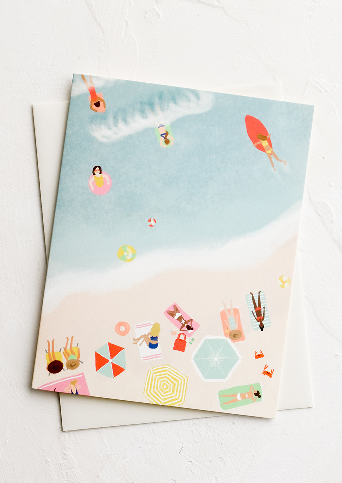 A textless greeting card with illustration of aerial view of people on a beach. 