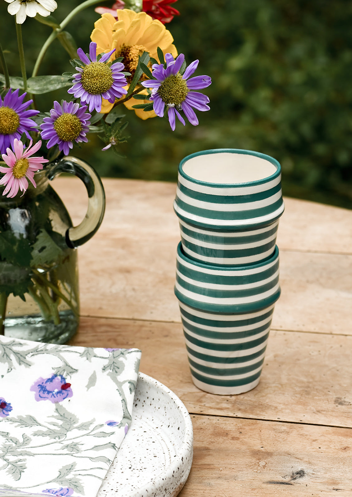 Two moroccan Beldi cups in striped teal ceramic.