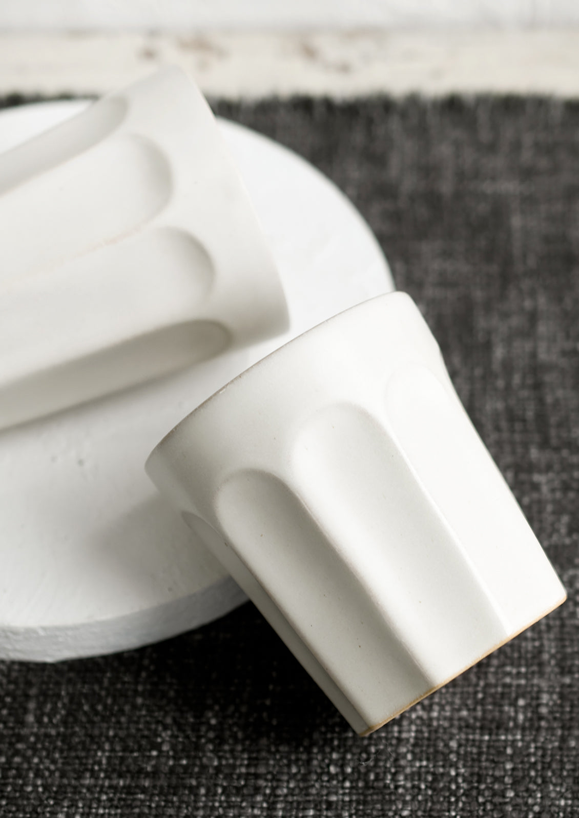 A ceramic bistrot style cup in white.