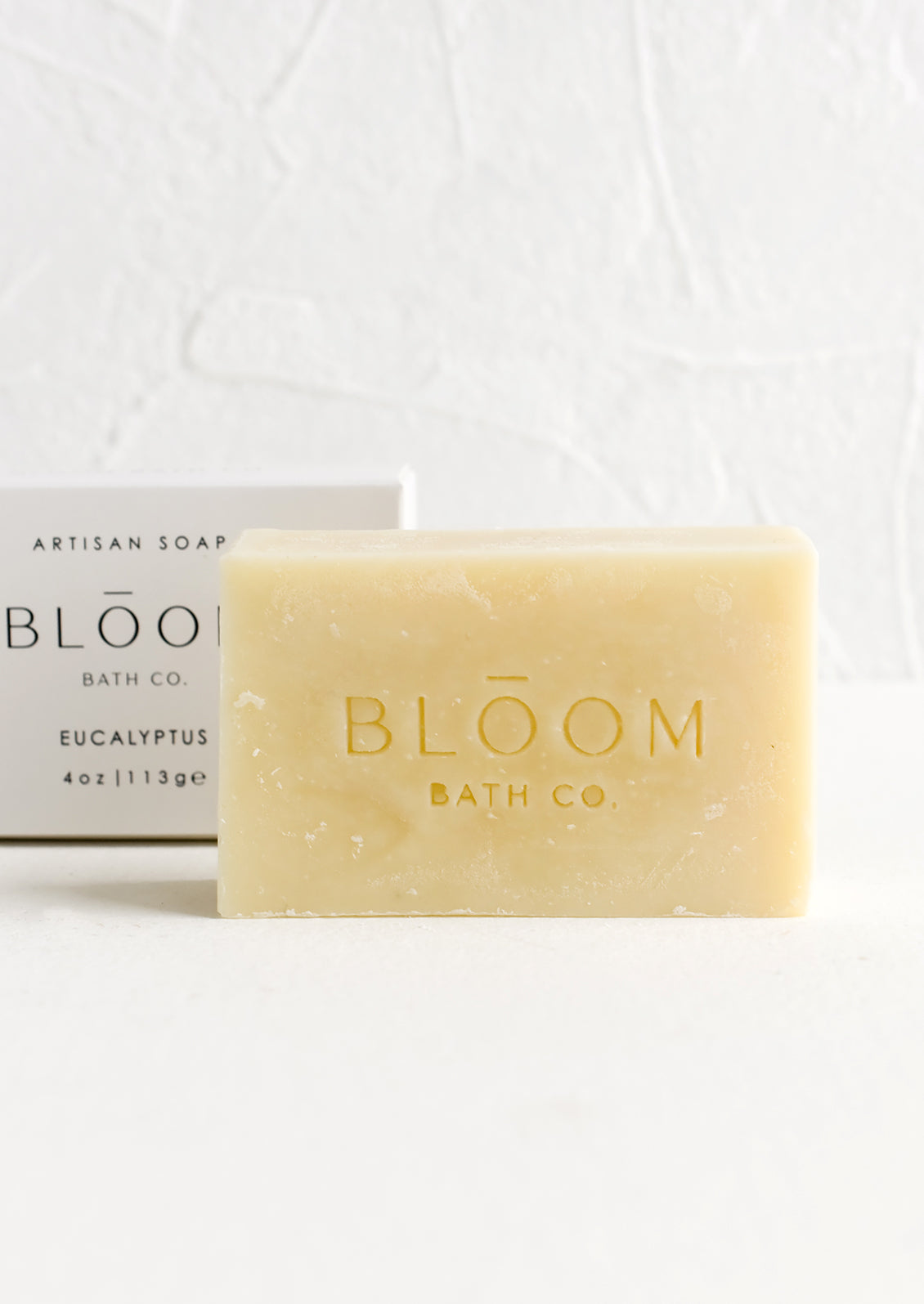 A bar of soap with minimalist packaging.