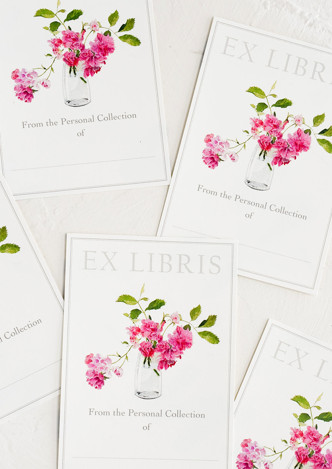 A five pack of rose print book plates.