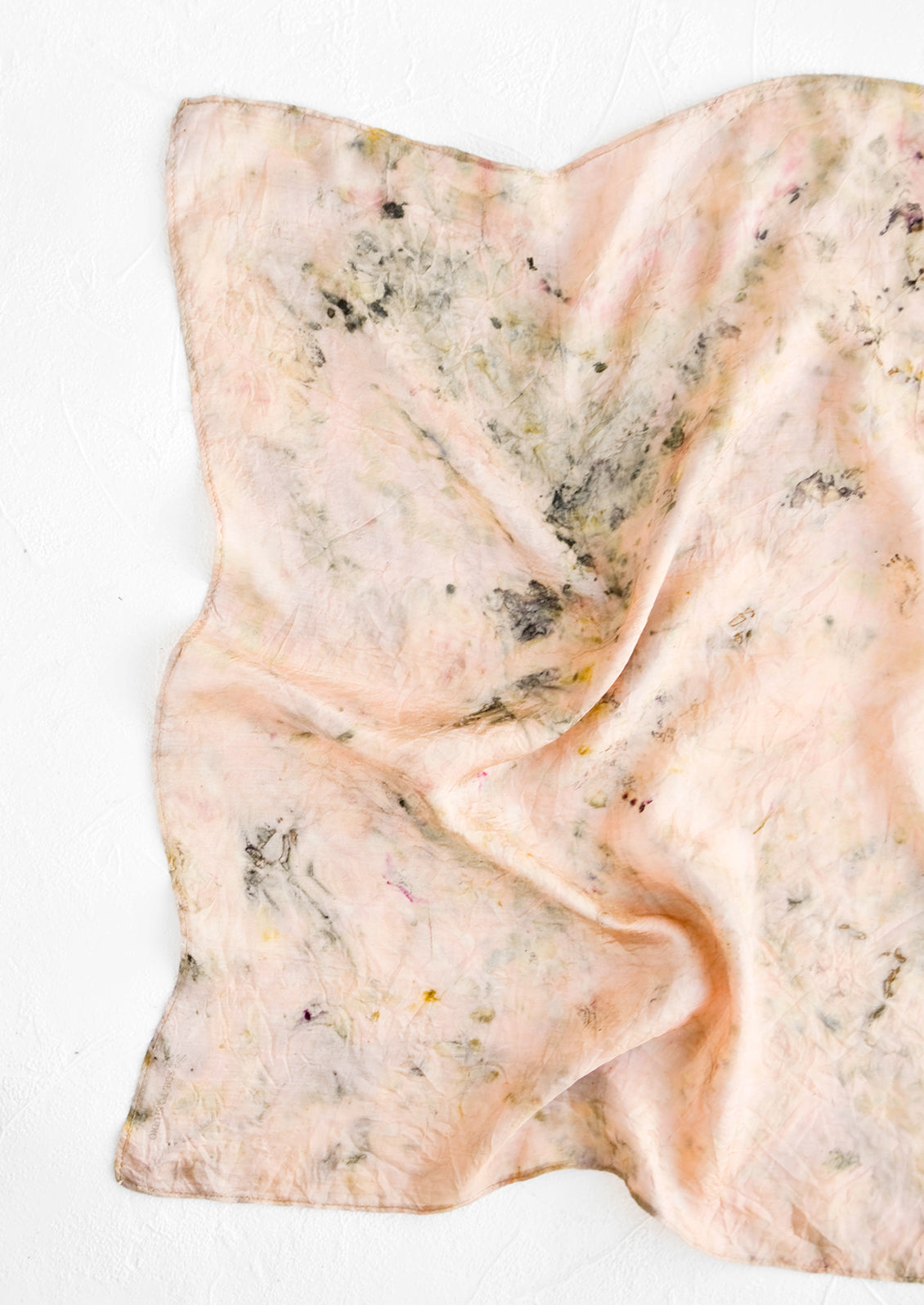 Botanically dyed, one of a kind silk scarf with randomized splatters of color. Pink with faint green and grey.