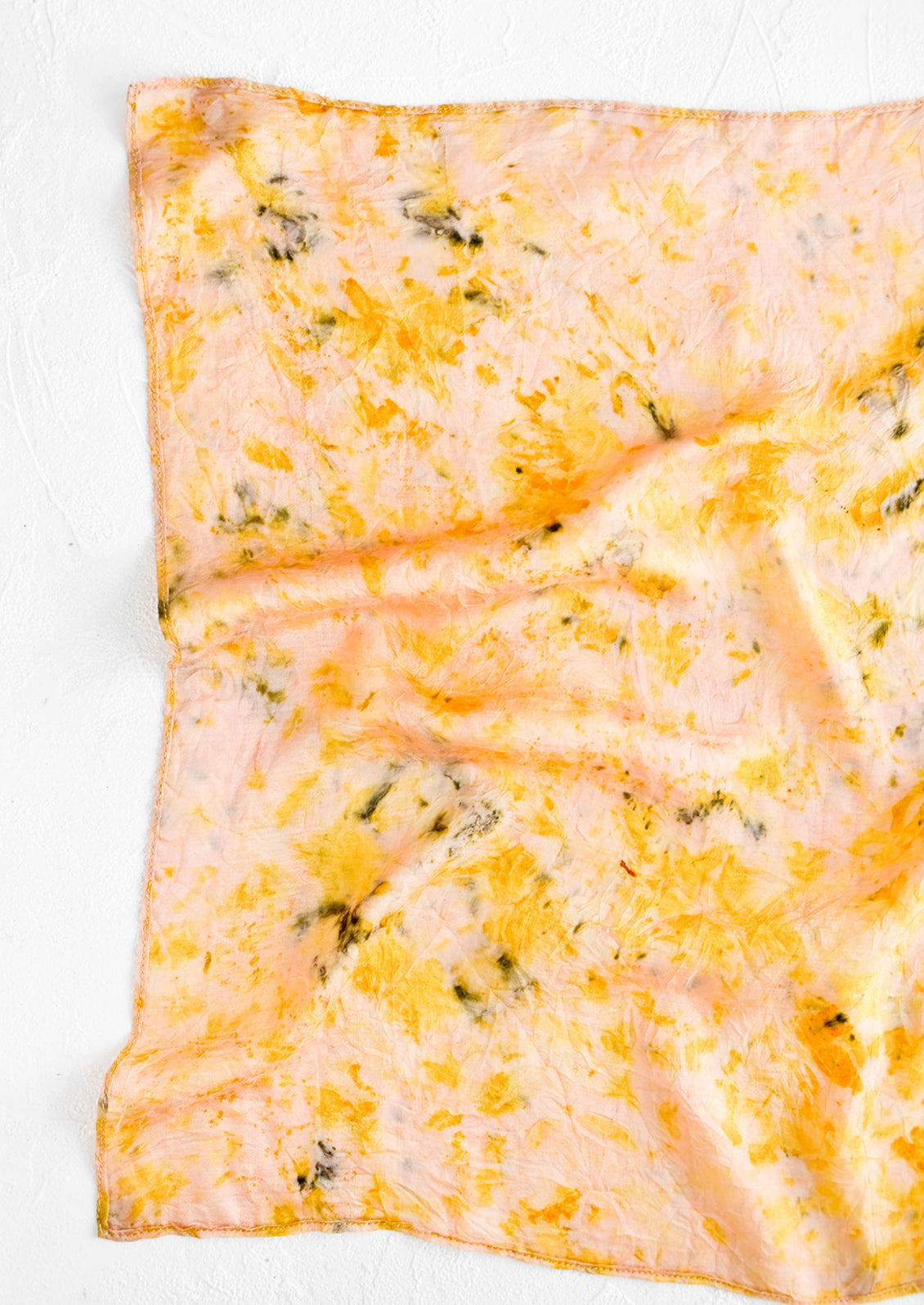Botanically dyed, one of a kind silk scarf with randomized splatters of color. Peach with yellow and black.